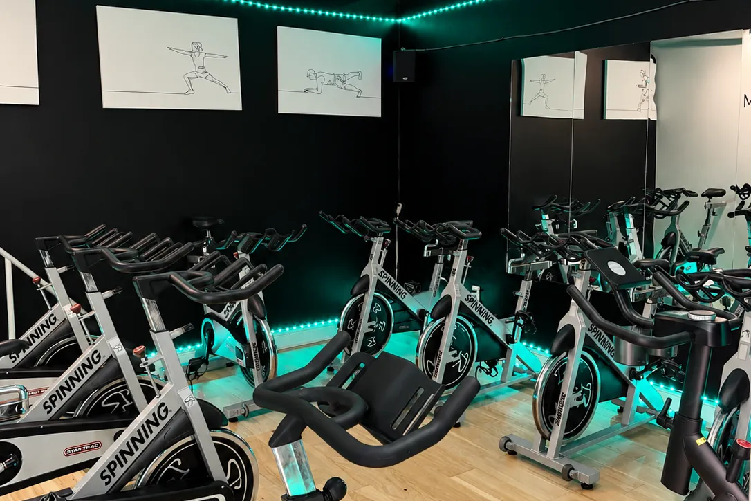 Spinning bikes in the cycling room at BodyRhythm
